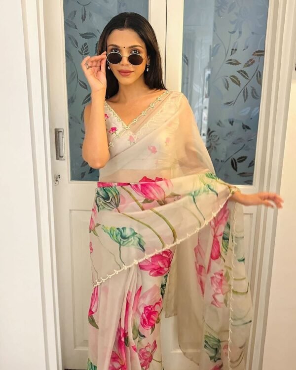 Striped Saree with Contrast Blouse – Stylish Pick